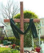 Cross with black cloth draped on it